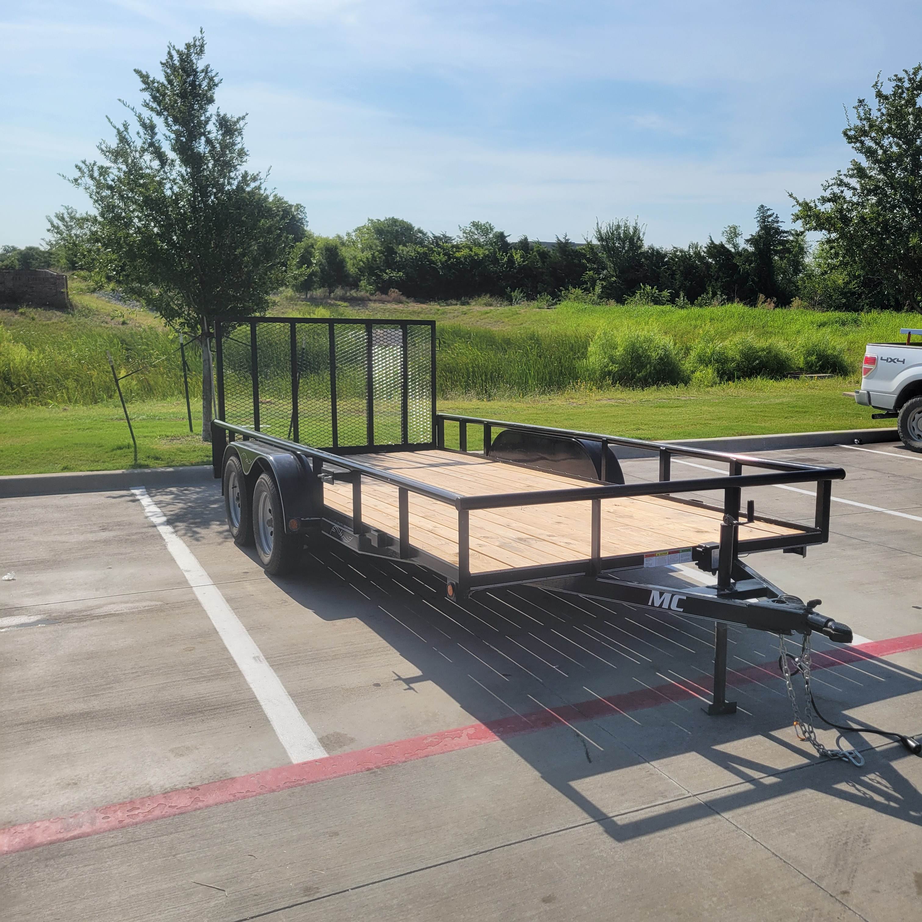 83 inch by 16 foot Iron Yoke LLC utility trailer ready for a hauling job in McKinney, TX — front view